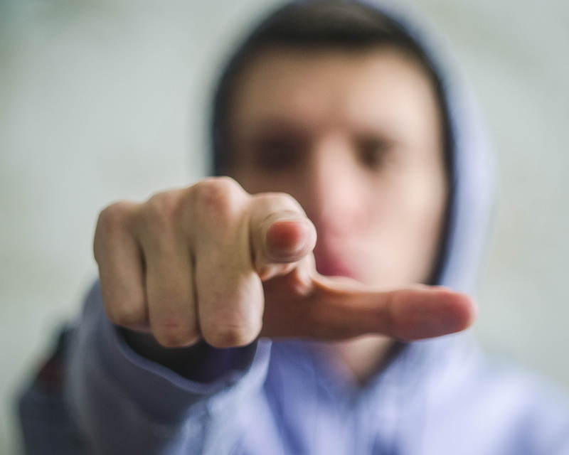 eyes, bussines, fist, one person, russia, human, aggression, people, portrait, teenager, technology, close-up, headshot, white, confrontation, gesturing