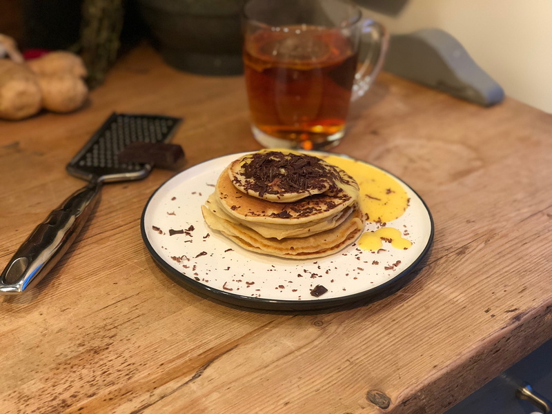 serving size, sweet food, white, no people, table, chocolate, black, burger, pancake, tortilla, cup, food, refreshment, close-up, eating utensil, saucer