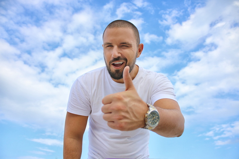 emotion, men, white, clouds, front view, nature, young man, luxury watch, shirt, lifestyles, healthy lifestyle, thumbs up, adult, wearing, blue sky, holding
