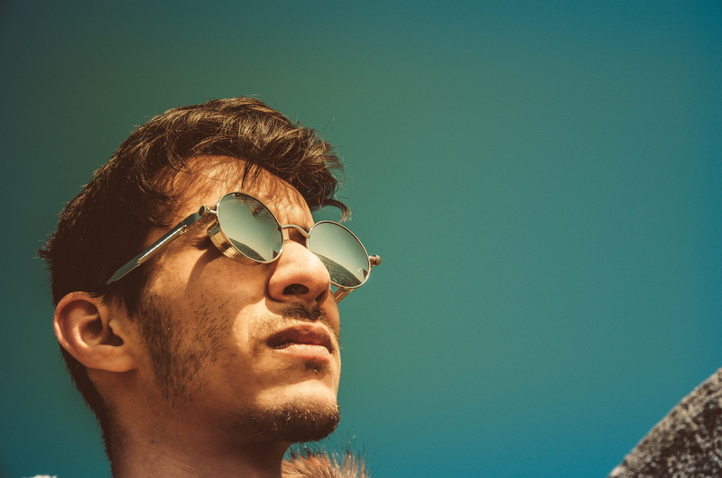 contemplation, hot, season, looking up, side view, eyewear, close-up, model, sunlight, portrait, headshot, black, profile view, man, blue sky, human body part
