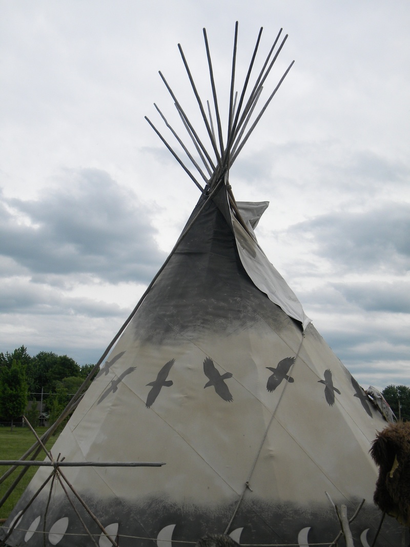 tepee, cloud - sky, renewable energy, tent, wigwam, built structure, grey, outdoors, environmental conservation, teepee, nature, day, native, shelter, flying