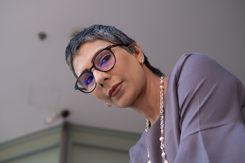 smiling, portrait, glasses, female ceo, photography, human, hairstyle, woman, finger, accessory, dress, unique, strong, accessories, one person, young adult
