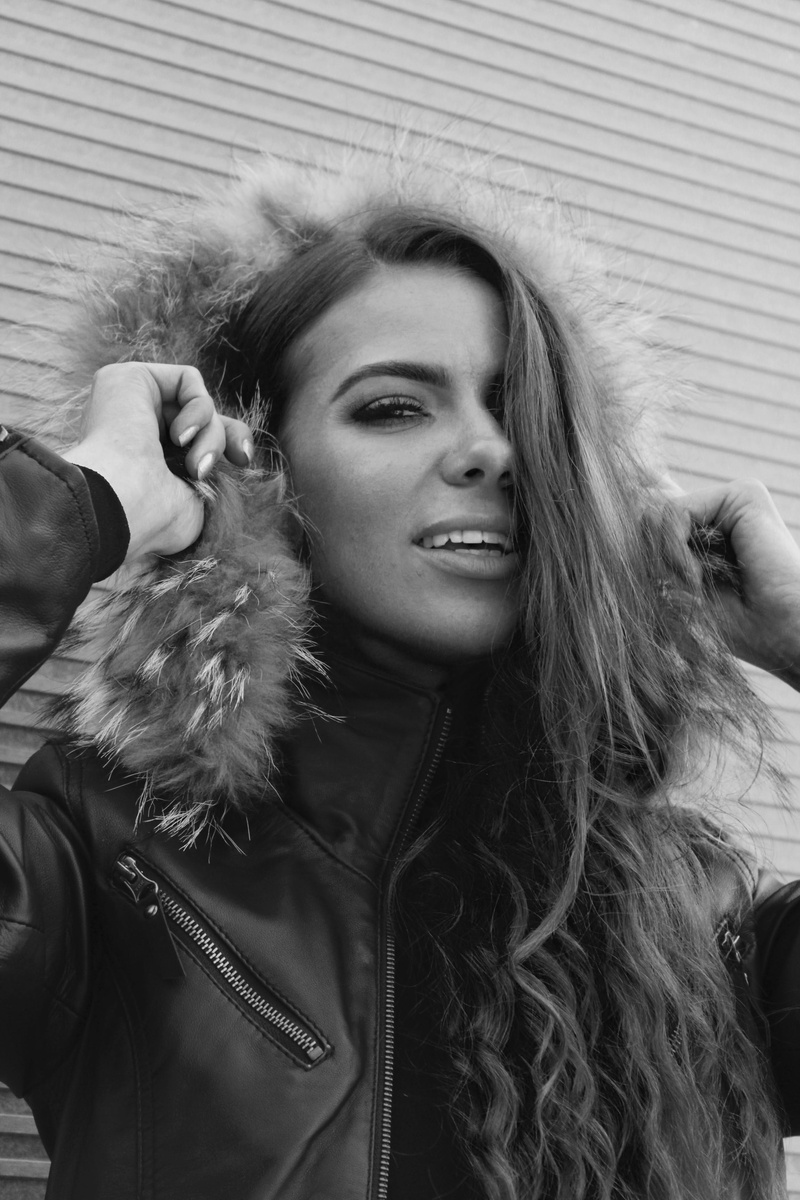 young adult, portrait, fearless, influencer, women, apparel, strong, warm clothing, success, leather jacket, finger, human, female, front view, headshot
