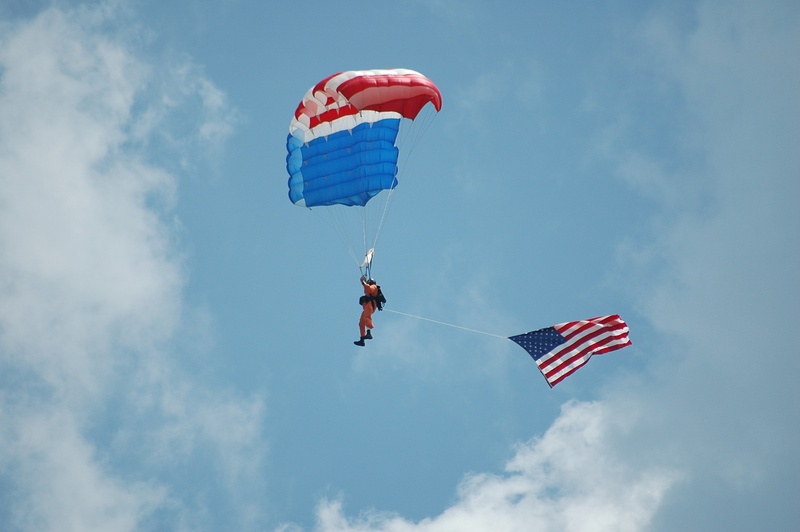 safety harness, unrecognizable person, high, recreation, sky, wind, extreme, flying, leisure activity, hobby, low angle view, danger, parasailing, skydiving