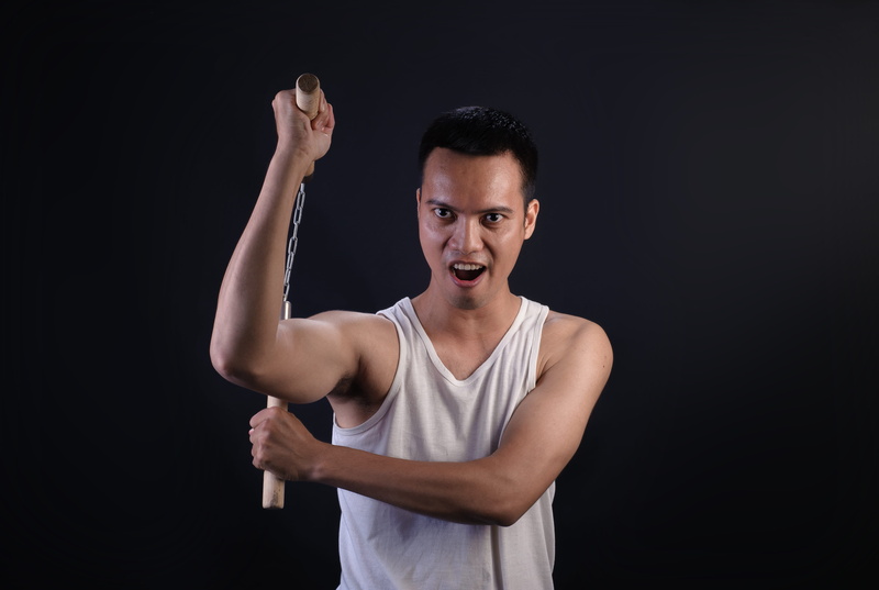 emotion, holding, portrait, tank top, adult, one person, 4K, human arm, man, aggression, studio shot, standing, front view, gesturing, looking at camera