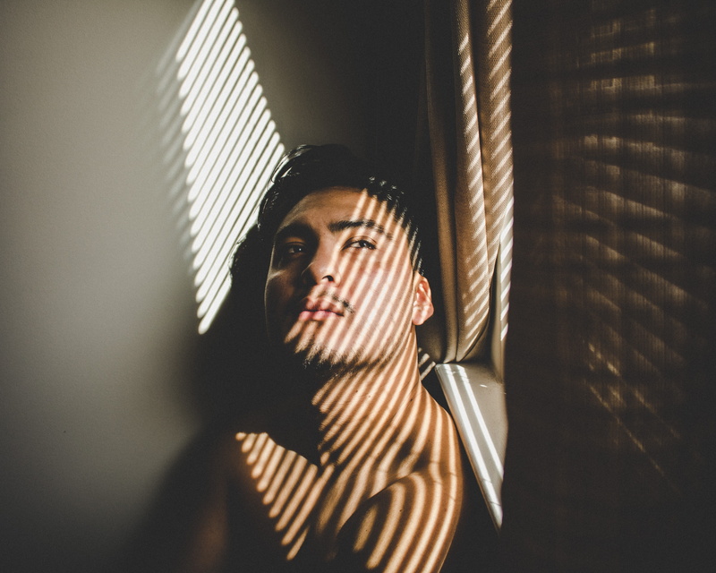indoors, home decor, depression - sadness, light - natural phenomenon, fir, serious, lip, looking, beautiful woman, tobias, banister, prison, sunlight