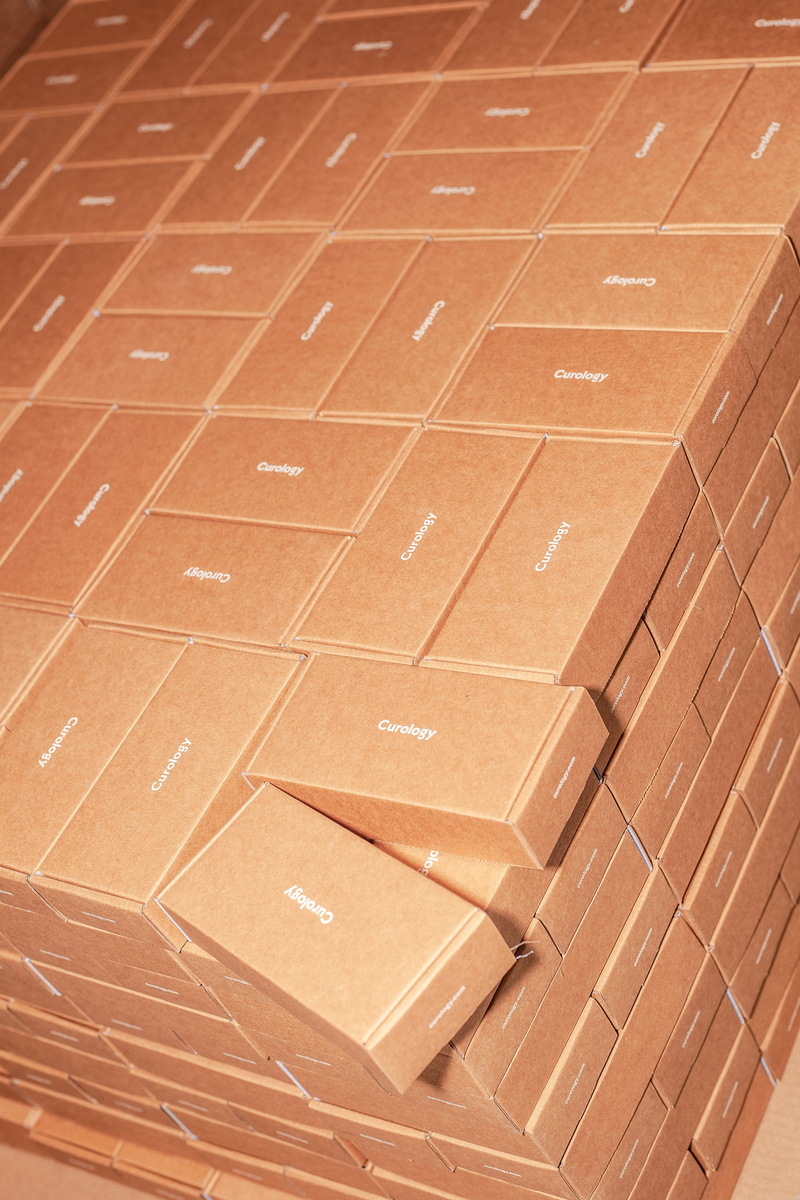 sunlight, box - container, backgrounds, full frame, handwriting, cardboard box, brown, l, apparel, cardboard, close-up, high angle view, curology, boxes