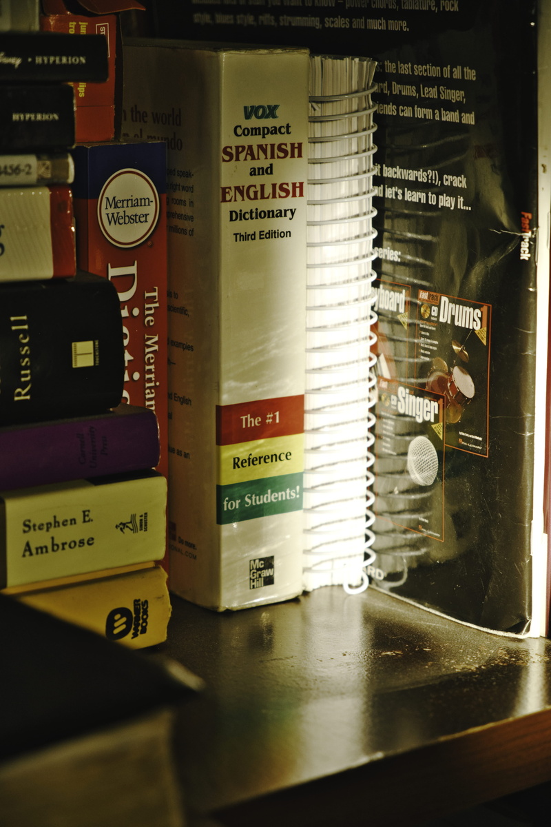 transparent, sign, no people, communication, bookcase, bottle, drink, furniture, western script, tire, liquor, reflection, still life, transportation, still  life