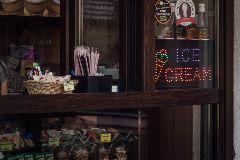 container, bookcase, neon, black, signage, furniture, food, cabinet, basket, 4K, no people, cupboard, cream, wood, sweet food, sweet, shop, person, retail