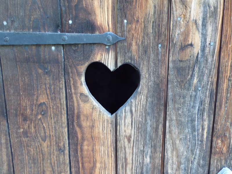 heart shape, security, peace and quiet, love, entrance, outdoors, full frame, hole, wood, shape, protection, heart, village, 4K, door, no people, loo with a view
