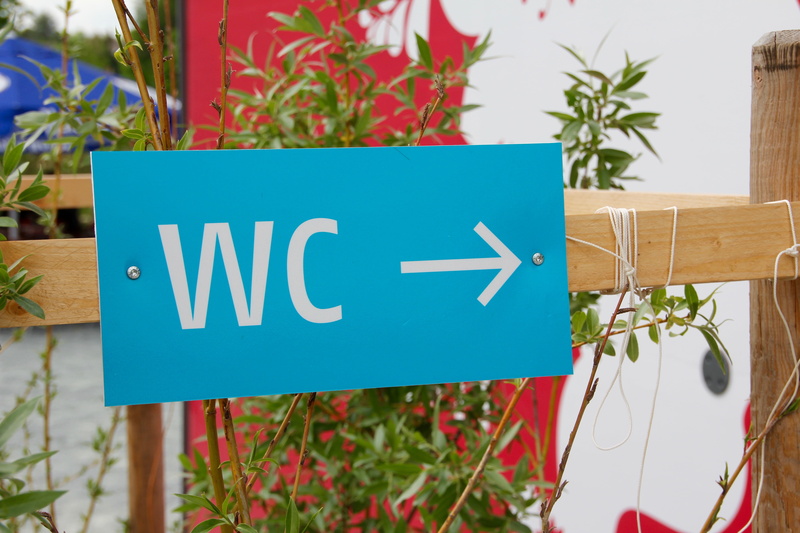 wc sign, message, plant, close-up, guidance, no people, flower, information sign, public toilet, shield, sign, direction, western script, arrow symbol