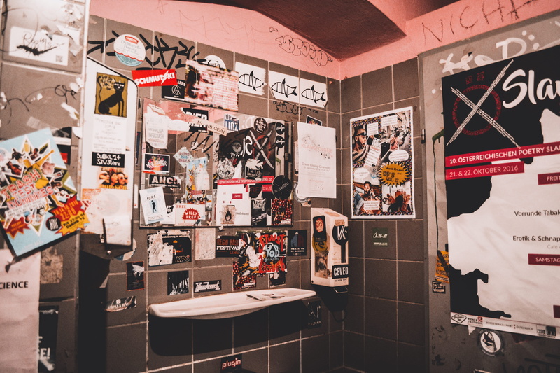 vandalized, vandalism, abundance, poster, messy, day, representation, communication, indoors, room, absence, lot, western script, ceramic, wall - building feature