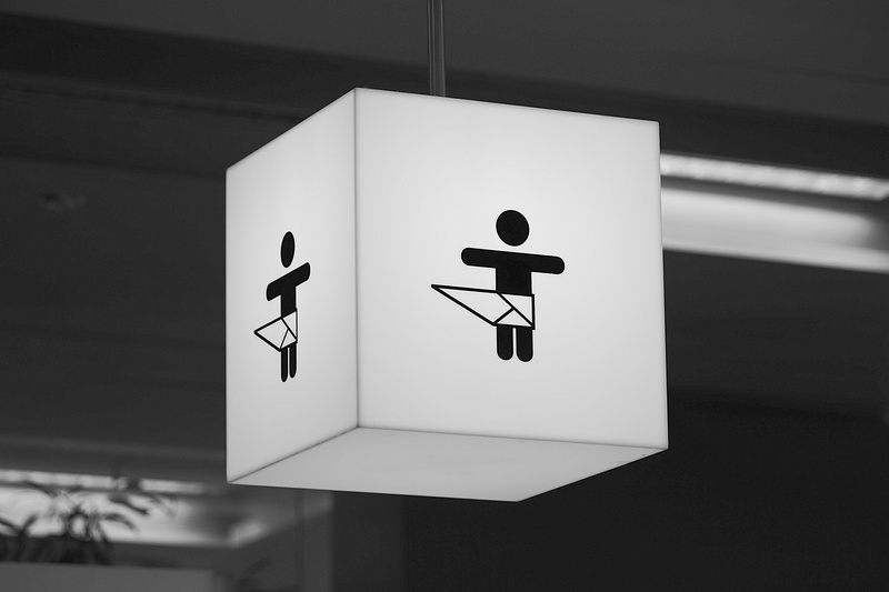 shield, small child, wrap, public restroom, indoors, sign, information sign, public building, bathroom, symbol, male likeness, representation, human representation