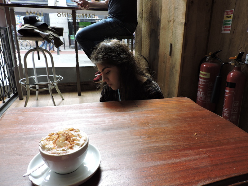 table, food, casual clothing, real people, coffee shop, leisure activity, sitting, lifestyles, refreshment, drink, dublin, indoors, kitchen utensil, one person