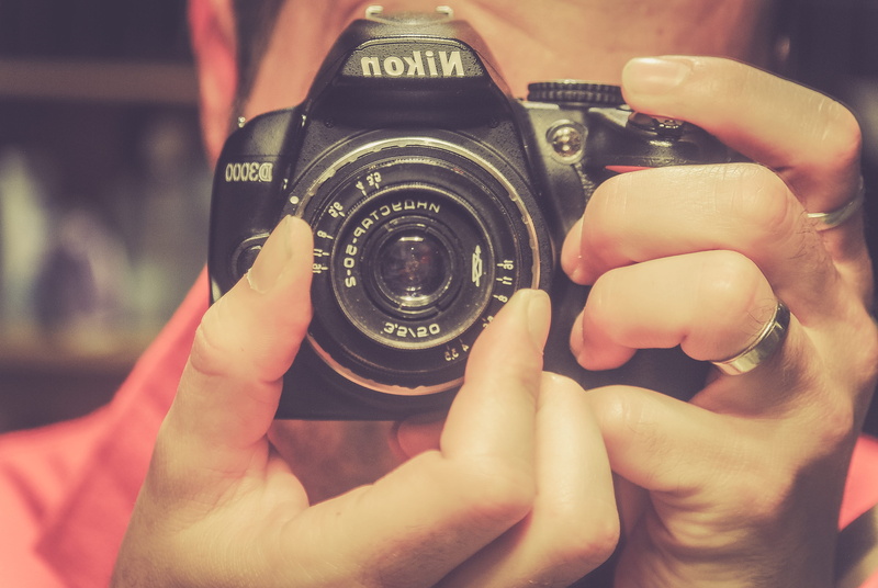 industar 50, technology, russian, photographer, photo, one person, real people, lens - optical instrument, el prat de llobregat, activity, hand, close-up