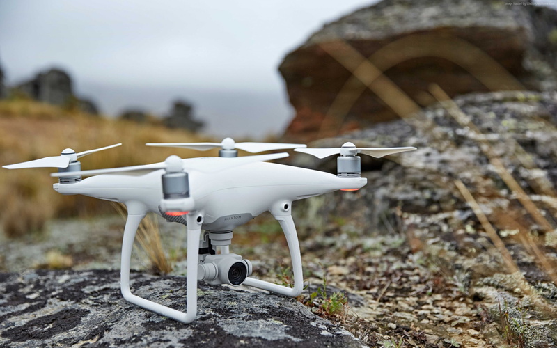 brands, mode of transportation, outdoors, land, rock, surveillance, technology, nature, dji, focus on foreground, phantom, military, drone, air vehicle