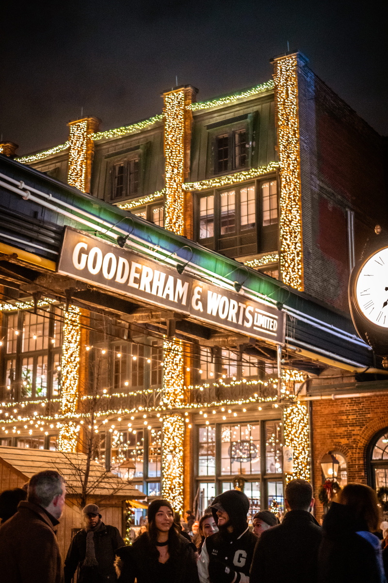 city life, analog clock, Toronto Distillery District, office building, group of people, real people, architecture, large group of people, building, home decor