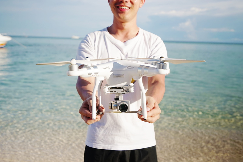 phantom, real people, standing, one person, asian, professional, technology, nature, sea, aerial, beach, young men, front view, camera, camera - photographic equipment