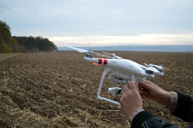 human body part, technology, day, 5K, finger, farmland, holding, airplane, grass, hand, dji, unrecognizable person, farming, drone cam, cropland, adult