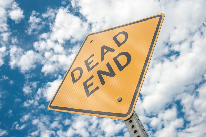 outdoors, black color, symbol, western script, communication, end, dead end, sky, low angle view, guidance, time, signpost, street, danger, safety, yellow