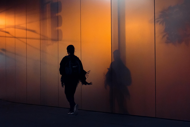 lifestyles, 4K, sillhouette, coat, handrail, pedestrian, door, city, wall, sunset, standing, rear view, wall - building feature, adult, person, men, full length