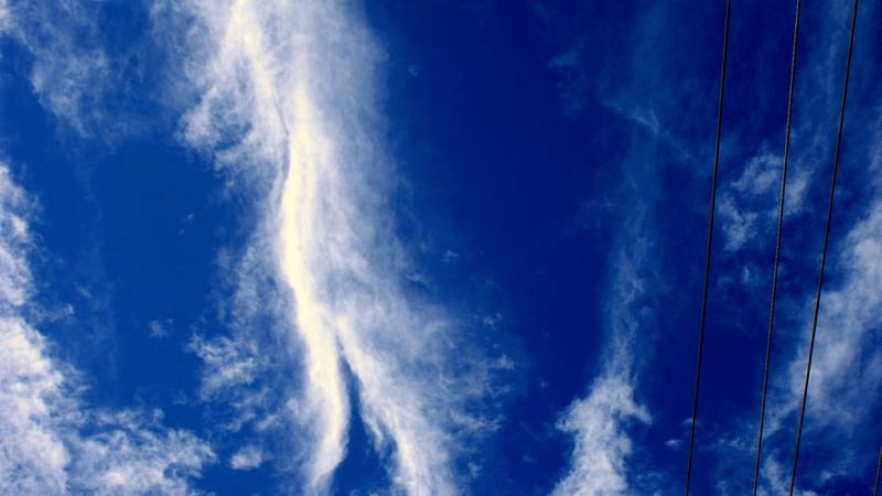 dramatic sky, low angle view, beauty in nature, day, moody sky, blue, cloudscape, no people, clouds, wind, scenics - nature, tranquility, meteorology, sky