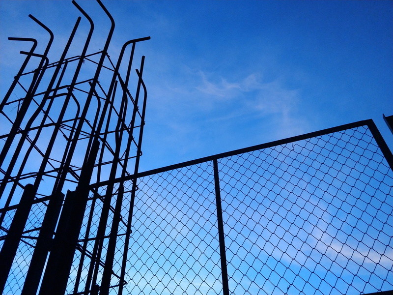 nature, barrier, wire mesh, outdoors, fence, blue, safety, alloy, protection, low angle view, chainlink fence, industry, lanscape, built structure, construction industry