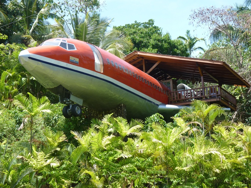 forest, land, sunlight, hotel, red, tree, transportation, nautical vessel, day, green color, nature, field, sky, outdoors, no people, abandoned, old, costa rica