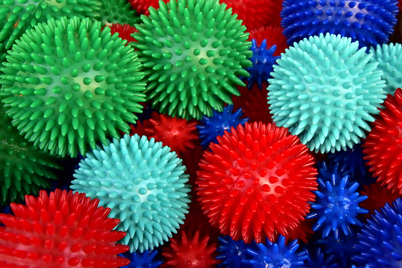 hedgehog balls, barbed balls, massage balls, still life, arrangement, full frame, close-up, indoors, feel good, colorful, design, wellness, green, high angle view