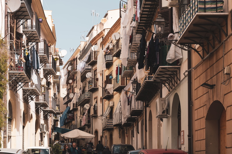 outdoors, no people, city, drying, nature, hanging, narrow, built structure, clothesline, building exterior, sicilia, row house, sunlight, residential district