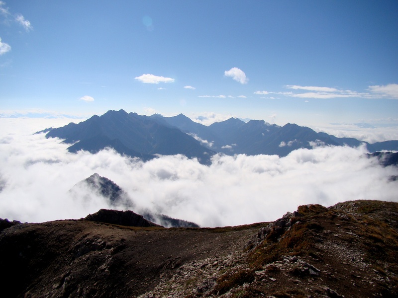 mountain range, hiking, mountain, national park, sky, mountain peak, environment, clouds, blue, tranquil scene, beauty in nature, volcanic crater, high
