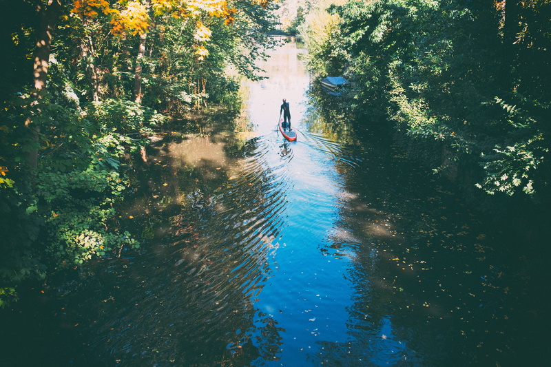 fall, water, exercise, lifestyles, fall colours, pond, land, boarding, outdoor, lakefront, autumn, real people, colors, reflection, riding, men, autumn colors