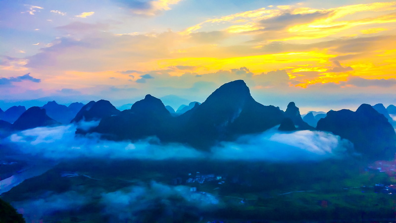 dramatic sky, tranquility, nature, mountain, cloud - sky, tranquil scene, beauty in nature, outdoors, landscape, non-urban scene, colorful, fog, environment
