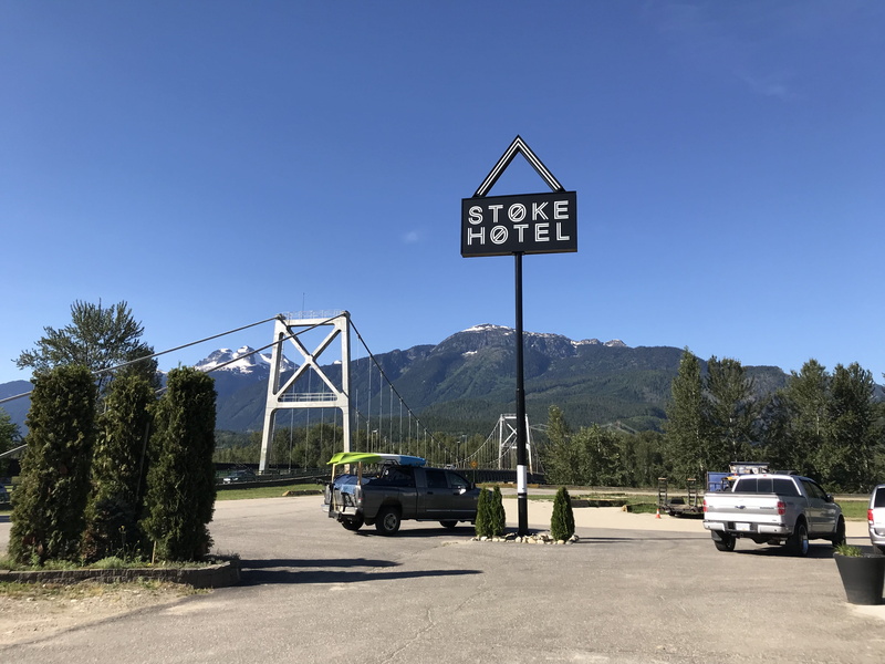 automobile, nature, sky, western script, motor vehicle, canada, transportation, revelstoke, vehicle, sign, text, british columbia, machine, tree, car, clear sky