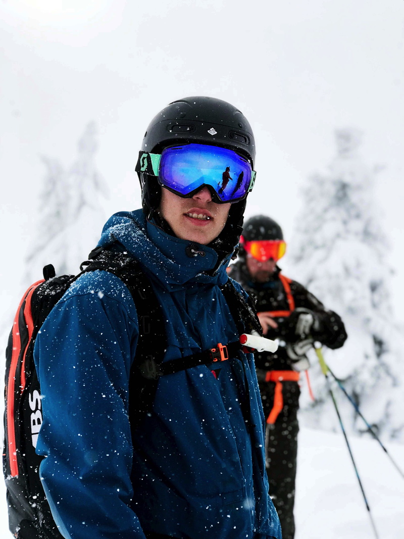 cold temperature, crash helmet, person, man, skiing helmet, wearing, human, clothing, looking at camera, coat, helmet, 4K, lifestyles, snowcapped mountain