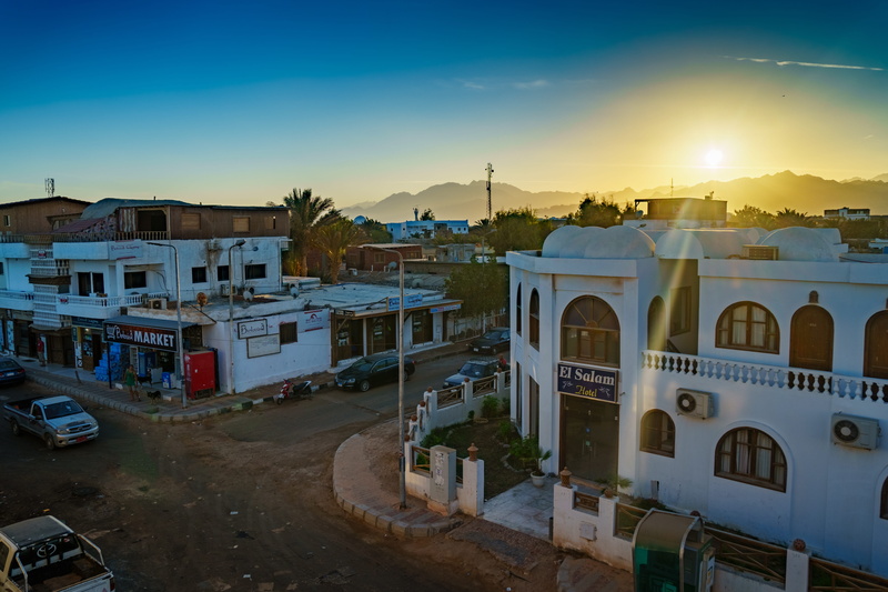 sinai, high angle view, road, residential district, dahab, no people, egypt, travel, nature, outdoors, mode of transportation, sunset, building exterior