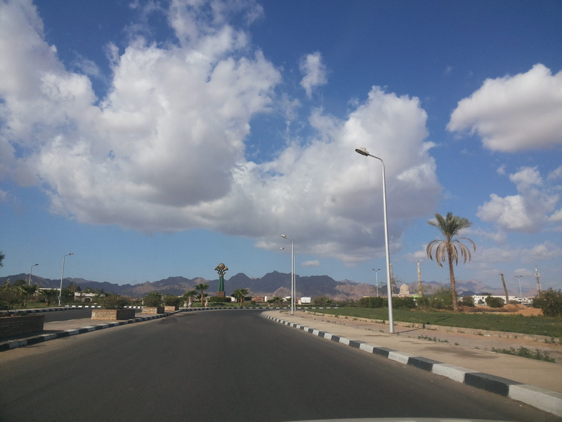 nature, egypt, road, sharm, land vehicle, no people, mode of transportation, street light, outdoors, sinai, city, motor vehicle, car, cloud - sky, built structure