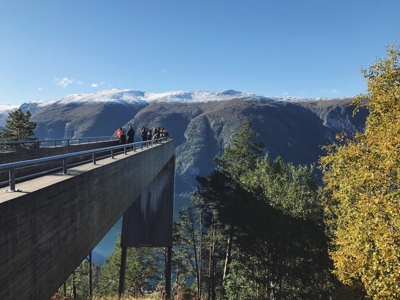 trees, mountain range, nature, aurland, norway, tranquility, bridge, cliff, mountain, men, plant, landscape, beauty in nature, group of people, sky, tranquil scene