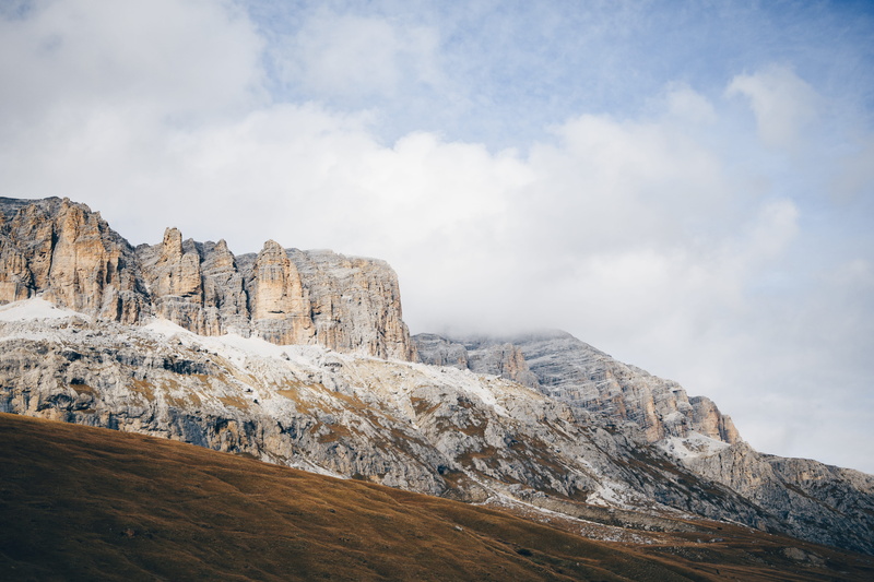 sky, no people, transportation, basin, rock, beauty in nature, brown, landscape, airliner, cloud - sky, plateau, countryside, day, grey, outdoors, mountain peak