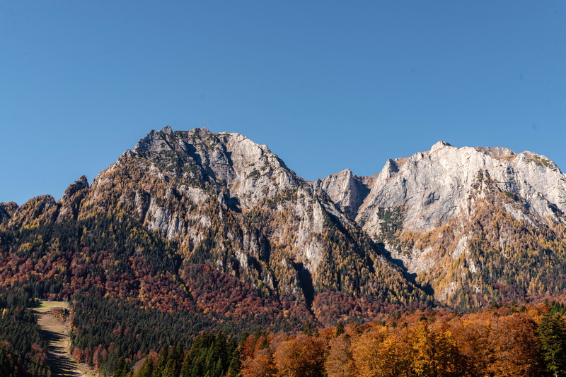 basin, outdoors, land, beauty in nature, pine tree, ice, non-urban scene, landscape, sky, surrounded, plant, mountain range, formation, scenery, mountain