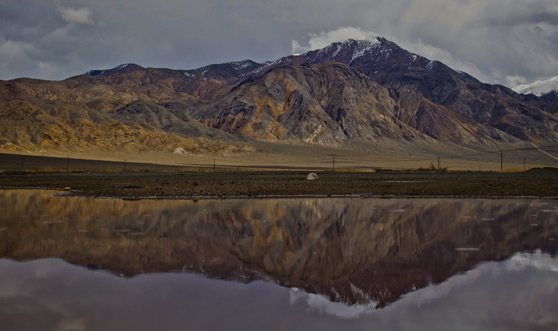 formation, tundra, cloud - sky, mountain peak, scenery, tranquil scene, rock, reflection, environment, promontory, peak, no people, outdoors, basin, slope