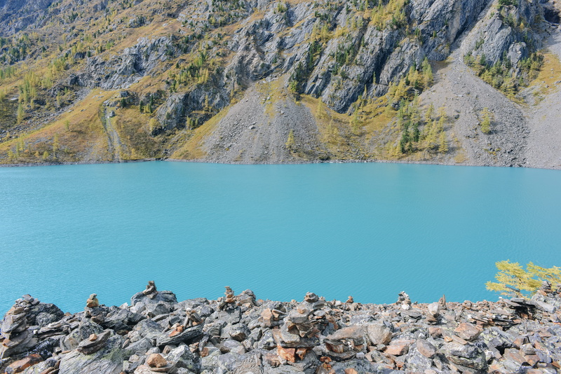 blue, solid, outdoors, beauty in nature, nature, lake, bird, water, crater, tranquility, basin, turquoise colored, promontory, green, rock, mountain peak