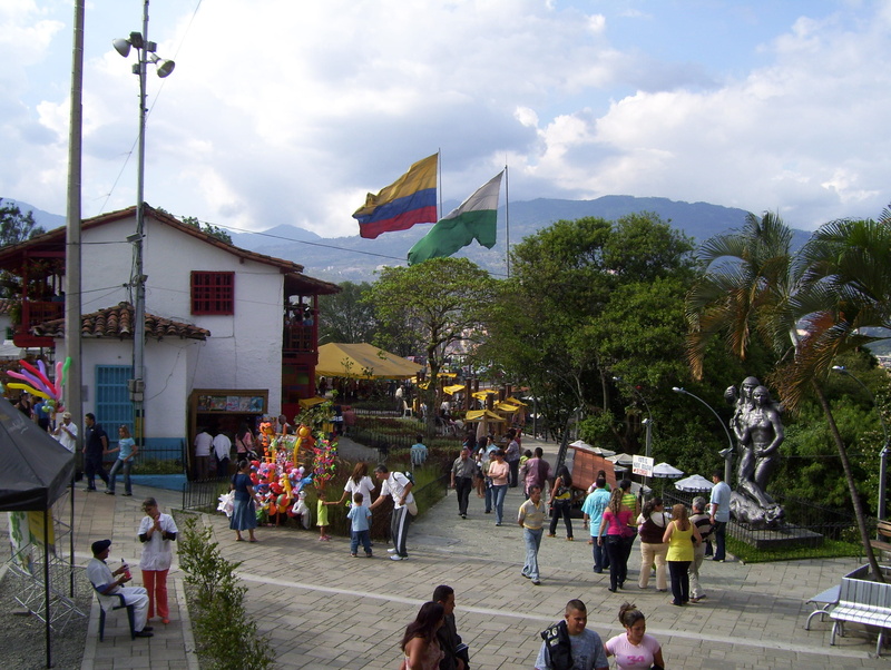 medellín, group of people, tourists, outdoors, people, sky, women, plant, road, adult, tree, lifestyles, building exterior, large group of people, square