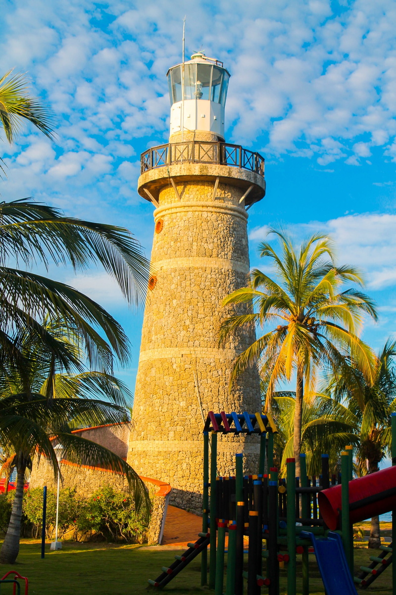 Cartagena, plant, low angle view, coconut palm tree, building exterior, blue, building, tourist, colombia, sunlight, tourism, beach, Lighthouse, trip, tower