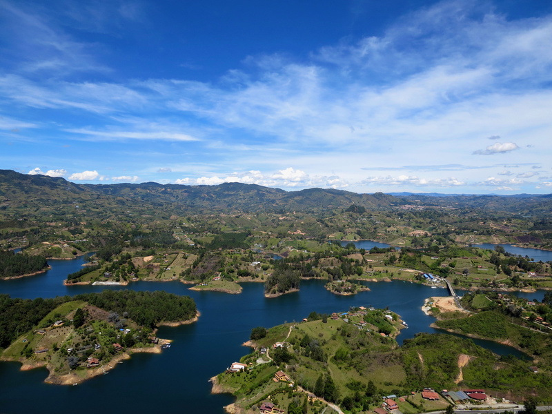 high angle view, tranquility, non-urban scene, cloud - sky, landscape, outdoors, tree, mountain, plant, day, nature, beauty in nature, colombia, blue, medellín