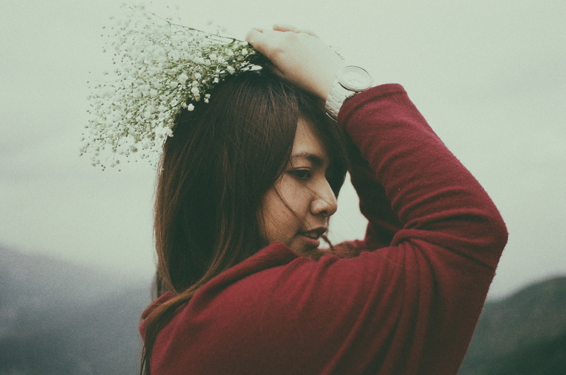girl, casual clothing, holding, petaled, asian, waist up, young women, flower, sweater, female, looking, depression - sadness, beautiful woman, people