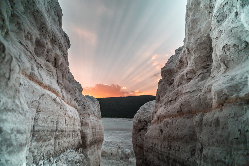geology, sea, outdoors, sunrise, 2K, tourism, summer, sunset, travel, stone - Object, blue, looking through, scenics, coastline, nature, valley, landscape
