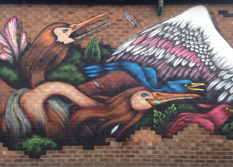 group of animals, animal representation, animal themes, nature, multi colored, indoors, manchester, animal wildlife, wall, attacking, day, animals in the wild