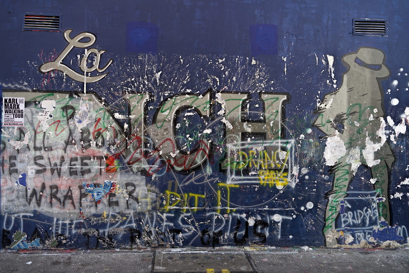 transportation, wall, people, western script, crowd, denim, communication, pants, creativity, building, outdoors, day, 5K, built structure, building exterior