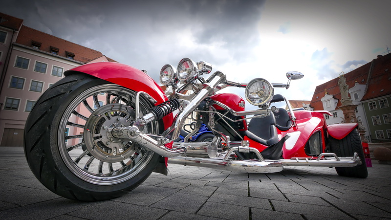 speed, wheel, day, park, tire, transportation, adult, full length, tricycle, sports race, mode of transportation, headwear, cruise, rocker, red, sport